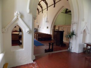 Berden_St_Nicholas_interior_-_12_chancel_arch_with_open_niches